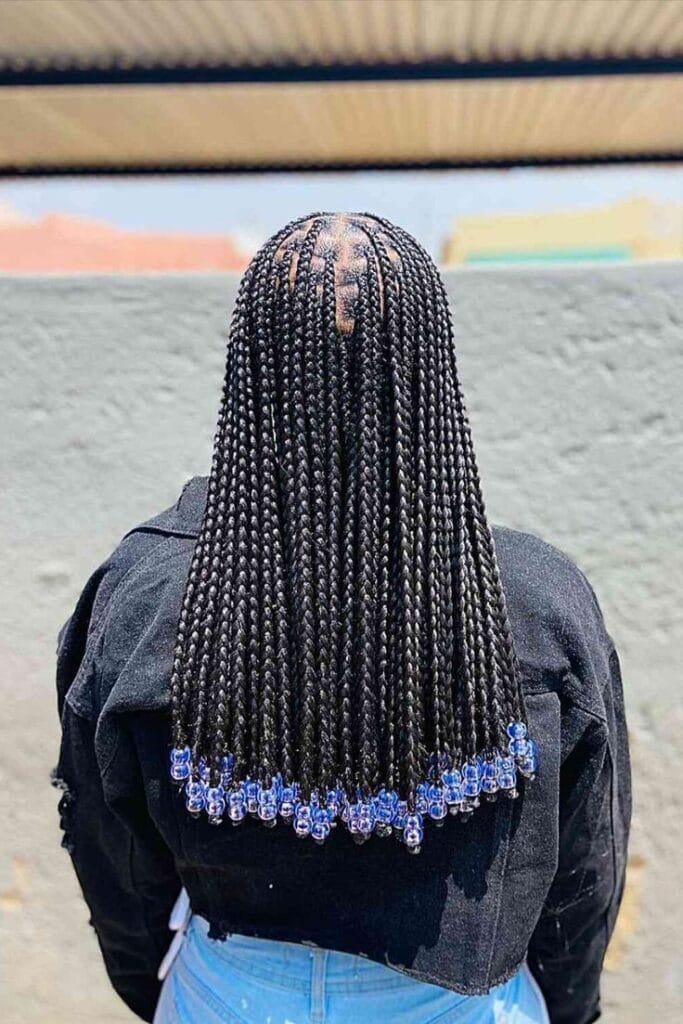 20 Ghana Weaving Styles You Should Try This Festive Season 39 Long Braids with Beads at Tips