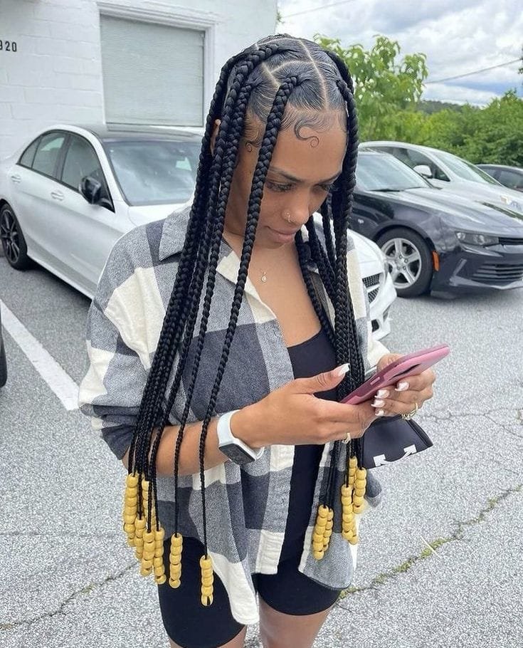 20 Ghana Weaving Styles You Should Try This Festive Season 38 Long Braids with Beads at Tips