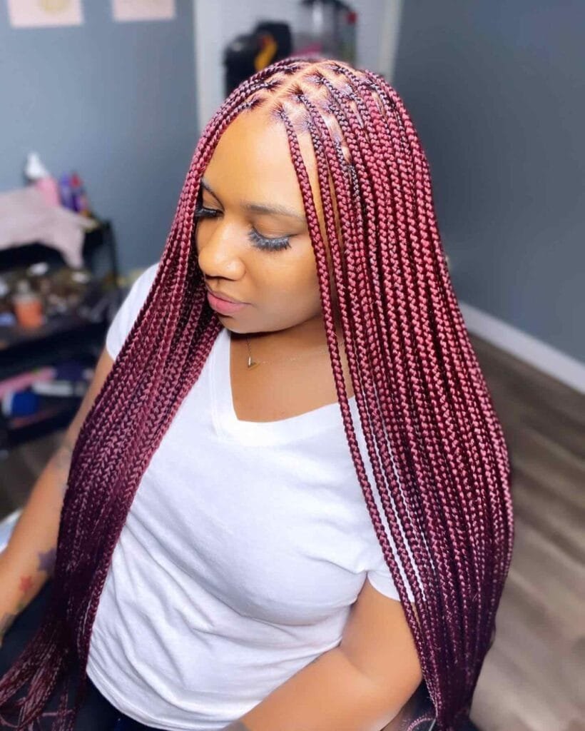 20 Ghana Weaving Styles You Should Try This Festive Season 26 Mid-sized Thick Braids with Multiple Partings
