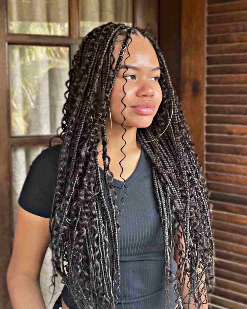 20 Ghana Weaving Styles You Should Try This Festive Season 47 Mixed-sized Long Flowing Braids