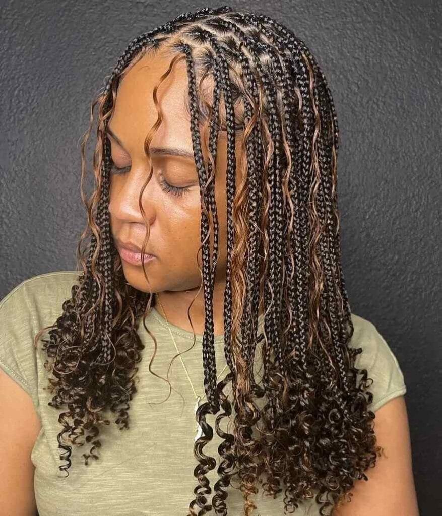 20 Ghana Weaving Styles You Should Try This Festive Season 34 Short Curled Brown Mid-sized Braids
