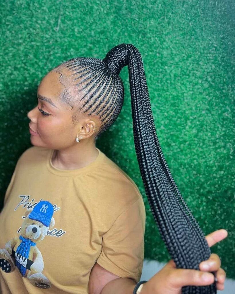 20 Ghana Weaving Styles You Should Try This Festive Season 12 Tiny Cornrows with Ponytail