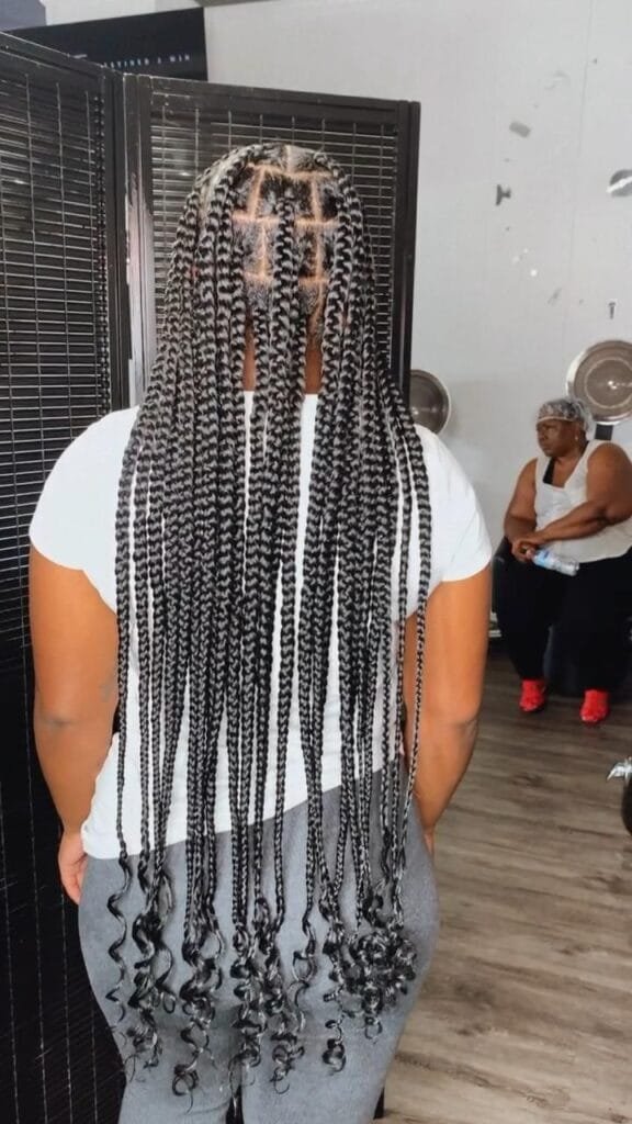 20 Ghana Weaving Styles You Should Try This Festive Season 32 Very Long Braids ending with Curls