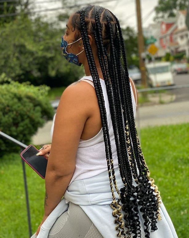 20 Ghana Weaving Styles You Should Try This Festive Season 33 Very Long Braids ending with Curls