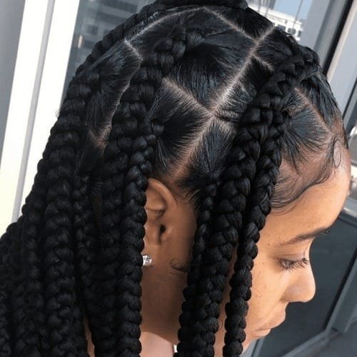 20 Ghana Weaving Styles You Should Try This Festive Season 28 Very Thick Braids with Multiple Partings
