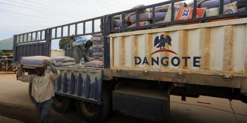 Aliko Dangote: How Africa’s Richest Man Built His Empire 15 Obajana Cement Plant, the largest in sub-Saharan Africa, with trucks loading cement, 2025.